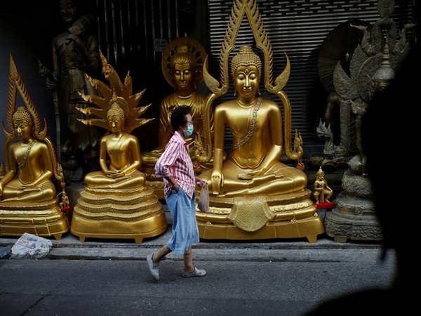 A woman wears a mask as a preventive measure against the coronavirus outbreak, in Bangkok