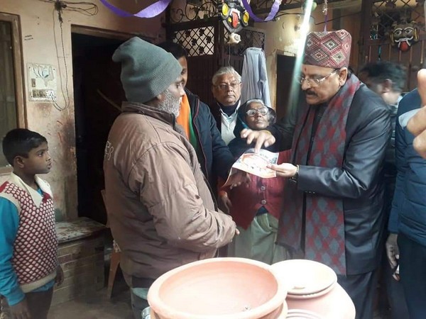 Uttarakhand BJP president Ajay Bhatt talking to people in Gobindgarh Kumhar Mandi, Uttarakhand on Sunday. Photo/ANI