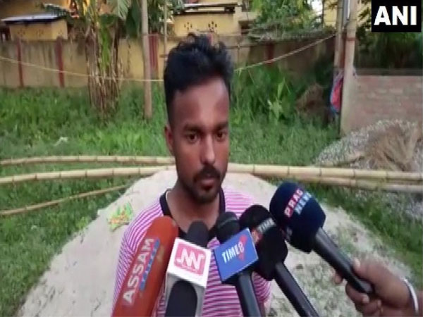 Amila Sah's son Bhola Sah talking to reporters in Sonitpur district in Assam on Monday.