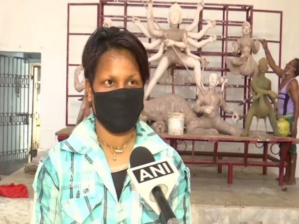 24-year-old daughter quits study to help father making idols in Bhubaneswar. Photo/ANI