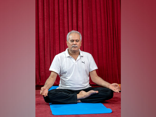 Chhattisgarh Chief Minister Bhupesh Baghel performing Yoga in Raipur. (Photo/ANI)