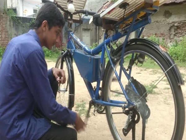 Class 12 student from Vadodara created solar bicycle with the help of scrap bicycle (Photo/ANI)