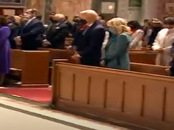 US President-elect Joe Biden and First Lady-elect Jill Biden attend Mass