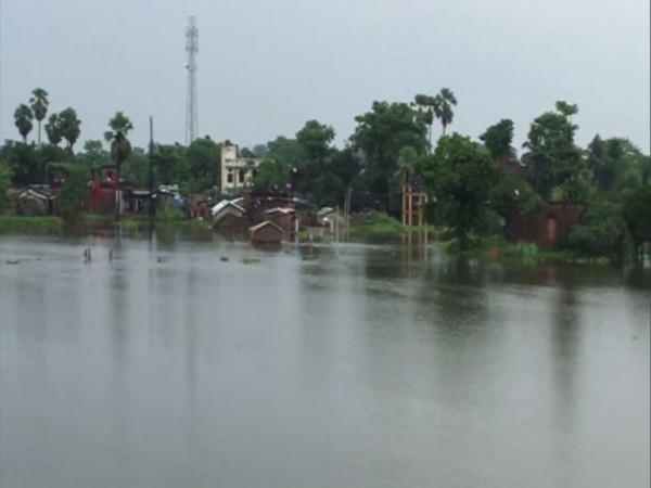 People in various districts of Bihar have been hit hard by floods for the last few days. Photo/ANI