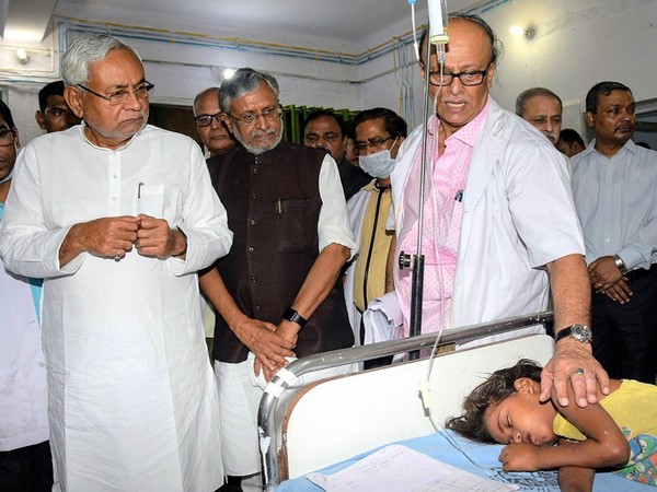 Chief Minister Nitish Kumar along with Deputy CM Sushil Modi visiting patients at SKMCH. (Photo/ANI)