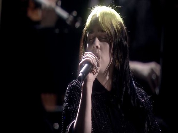 A still of singer Billie Eilish from her debut performance of Bond Song 'No Time to Die' at the 2020 Brit Awards on Tuesday (local time) (Image courtesy: YouTube)