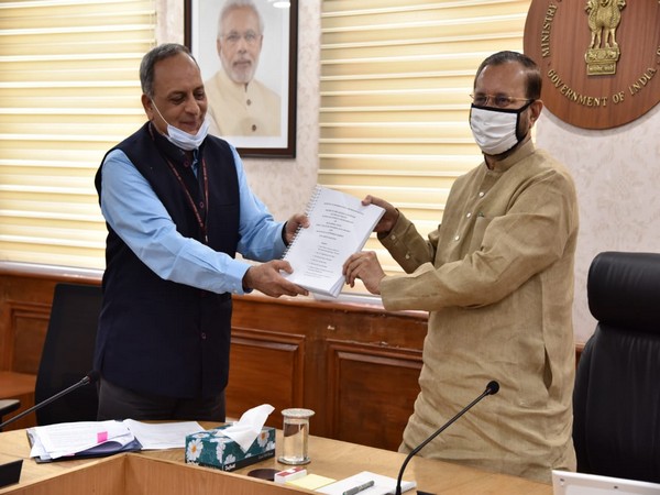 Bimal Julka submitting review report to Prakash Javadekar on Tuesday. Photo/ANI