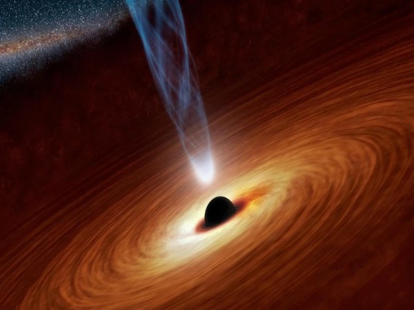 The black hole's mass is about 8,000 times bigger than the black hole in the centre of the Milky Way. (Image credits: NASA/JPL-Caltech)