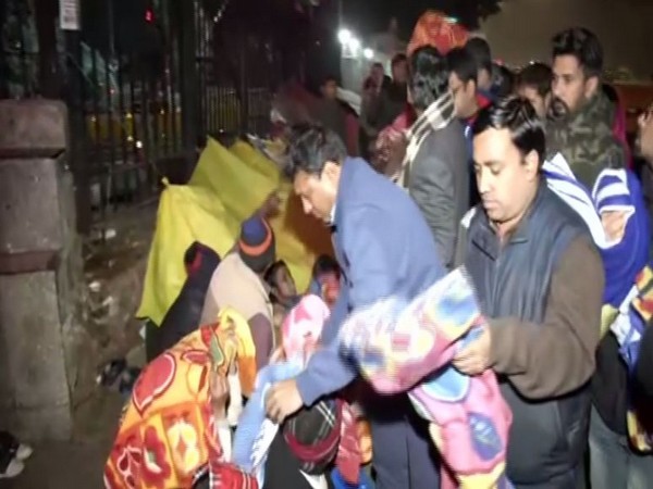 Youth Congress distributed blankets outside AIIMS on Sunday. 
