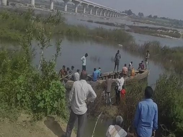 Rescue operations underway to fish out bodies of two forest officers who drowned in Pranahitha river on Sunday morning. (Photo/ANI)