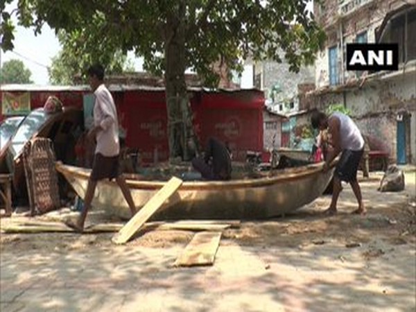 Boat artisans in Sarsaiya Ghat, Kanpur, Uttar Pradesh. (Photo/ANI)