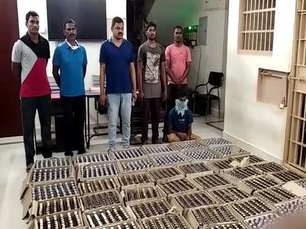 Liquor seized by Andhra Pradesh Police from a car in Krishna district on Friday. Photo/ANI