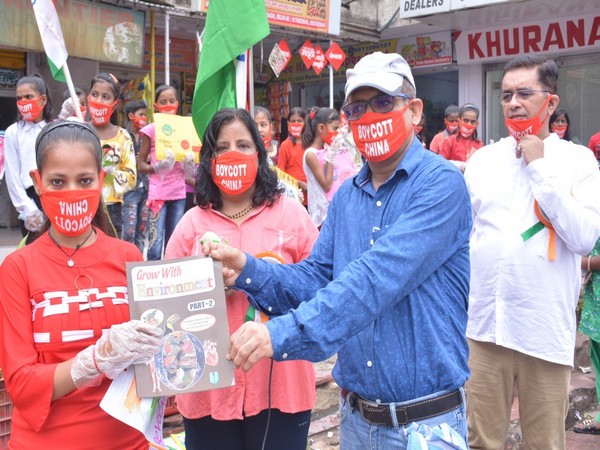 Social activist Shekhar Gupta distributing 'Made-in India' products. Photo/ANI