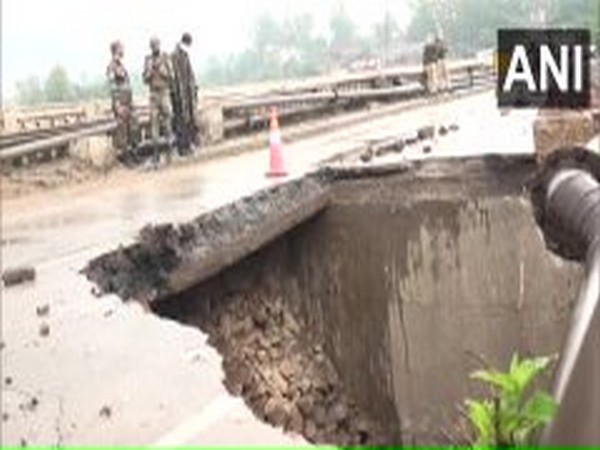Birmah bridge collapses due to heavy rainfall in J-K on Saturday. Photo/ANI