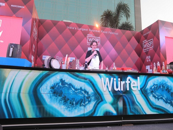 British Chef Marco Pierre White cooking in a Wurfel all-glass Sicis kitchen