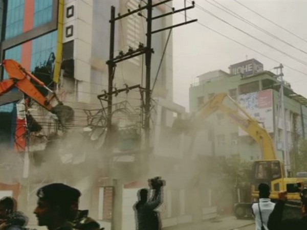My Home dance bar located in Geetabhavan being demolished on Thursday morning. (Photo/ANI)