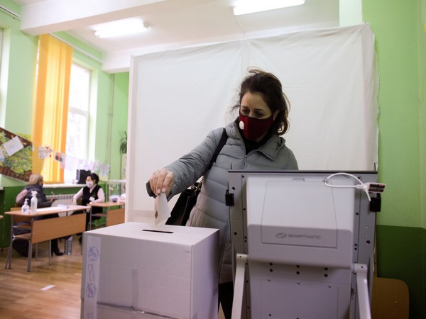 A woman votes in a polling station during the parliamentary election in Bulgaria (Photo/Credit: Reuters Image)