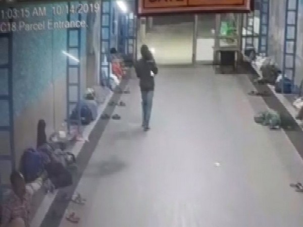 CCTV footage showing an unknown person picking up the girl from the station premises. Photo/ANI