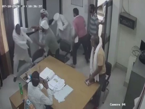 A still-shot of the CCTV footage of goons attacking the villagers at SDO office in Munak, Haryana