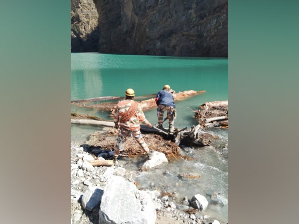 ITBP officials near the lake formed in Chamoli (Photo/ANI)