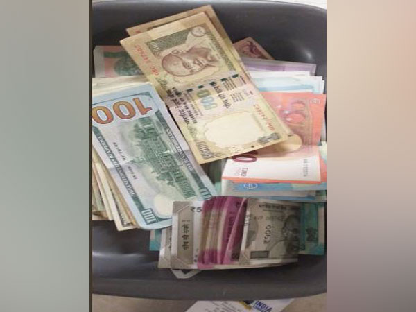 Seized amount recovered by CISF at Cochin Airport. Photo/ANI