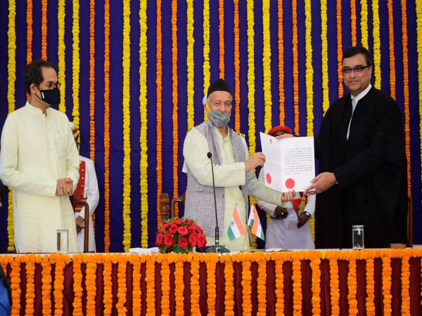 A visual from the swearing-in ceremony held at Raj Bhavan, Mumbai on Tuesday. Photo/ANI