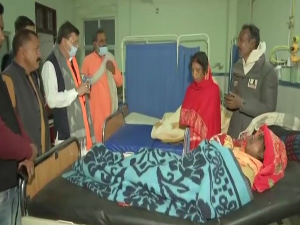 Uttarakhand Chief Minister Pushkar Singh Dhami interacting with the patients of Khatima civil hospital. (ANI/photo)