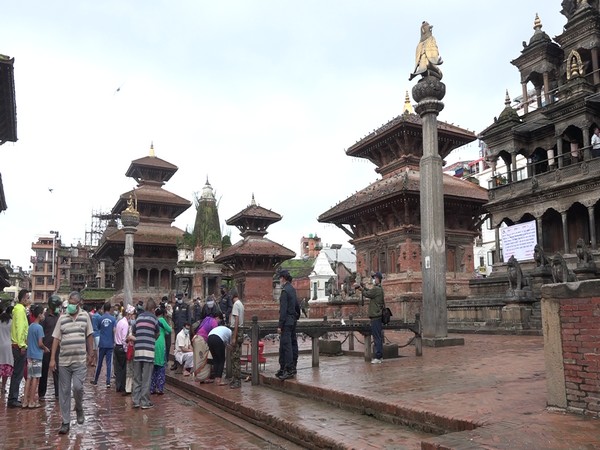 People offering prayers to Lord Krishna at the courtyard of Patan Durbar Square on Janmashtami. Photo/ANI