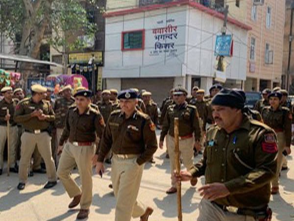 Delhi Police Commissioner SN Srivastava leading the foot patrolling in the city on Tuesday. Photo/Delhi Police Tweet