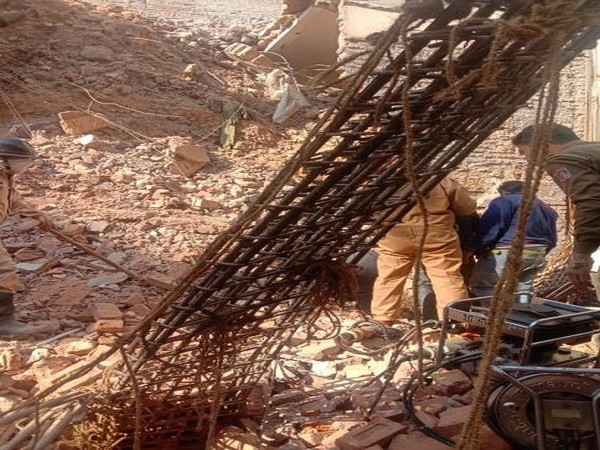 One person is feared trapped in the debris after a house collapsed in CR park in the national capital today. Photo/ANI