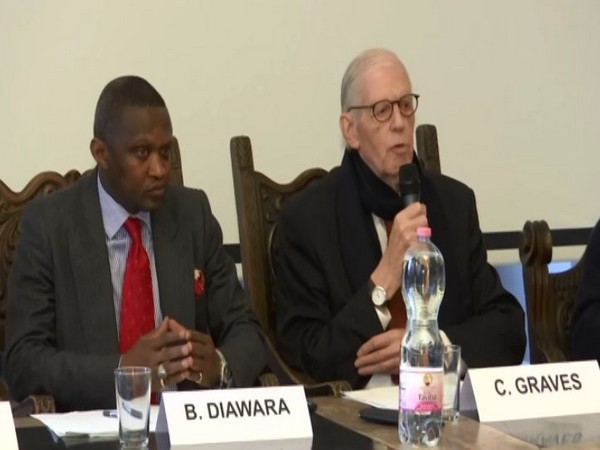 Charles Graves (R), a human rights defender and expert on Pakistan affairs, speaking at an event in Geneva
