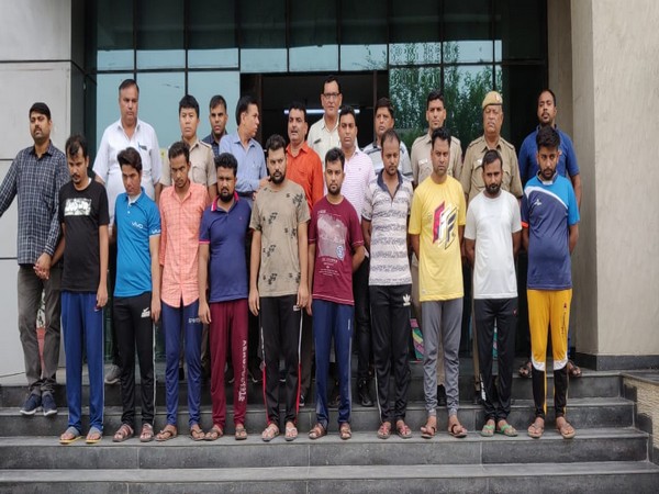 Delhi Police with the accused outside Begumpur police station on Saturday. Photo/ANI