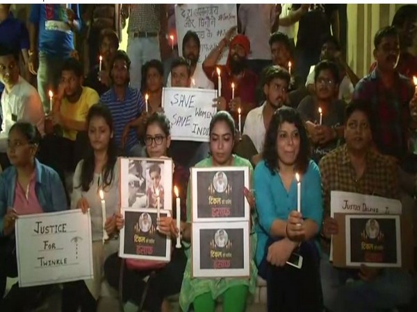 A candle light march was organised in Lucknow on Friday, seeking prompt justice for Twinkle Sharma. Photo/ANI