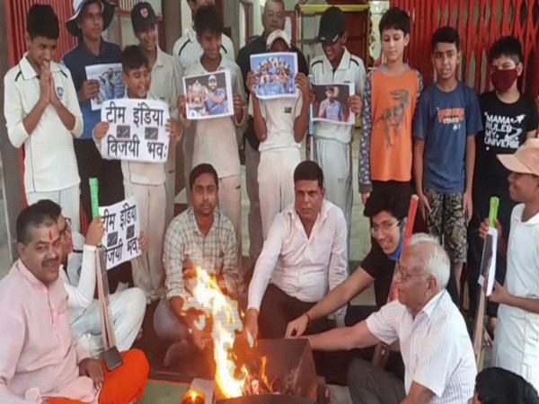 Cricket fans performing havan praying for Team India's win in Moradabad. (Photos/ANI)