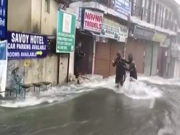 Flooded roads have disrupted the normalcy of everyday life in Nainital. (Photo/ANI)
