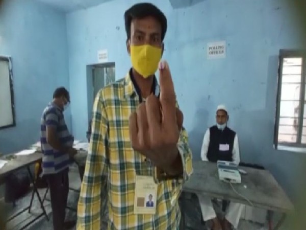 A voter shows his inked finger after casting his vote in Huzurabad by-polls on Saturday. (Photo/ANI)