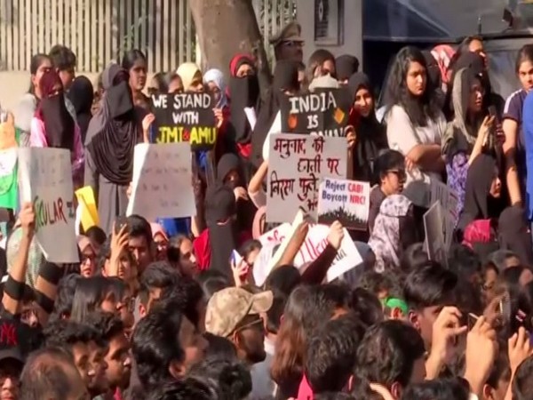 People protesting at Gandhi Ashram in Gujarat on Tuesday (Photo/ANI)