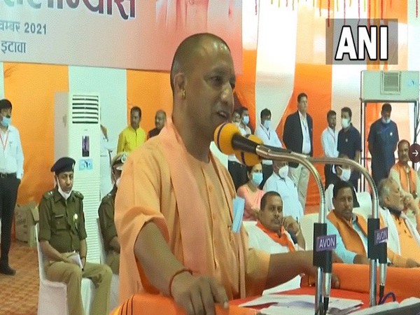 UP CM Yogi Adityanath addressing a gathering in Etawah on Saturday. (Photo/ANI)