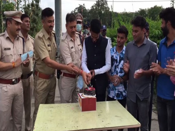 A youth celebrating his birthday with Indore police