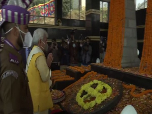 Lieutenant Governor of Jammu and Kashmir Manoj Sinha paying tribute to martyred police personnel