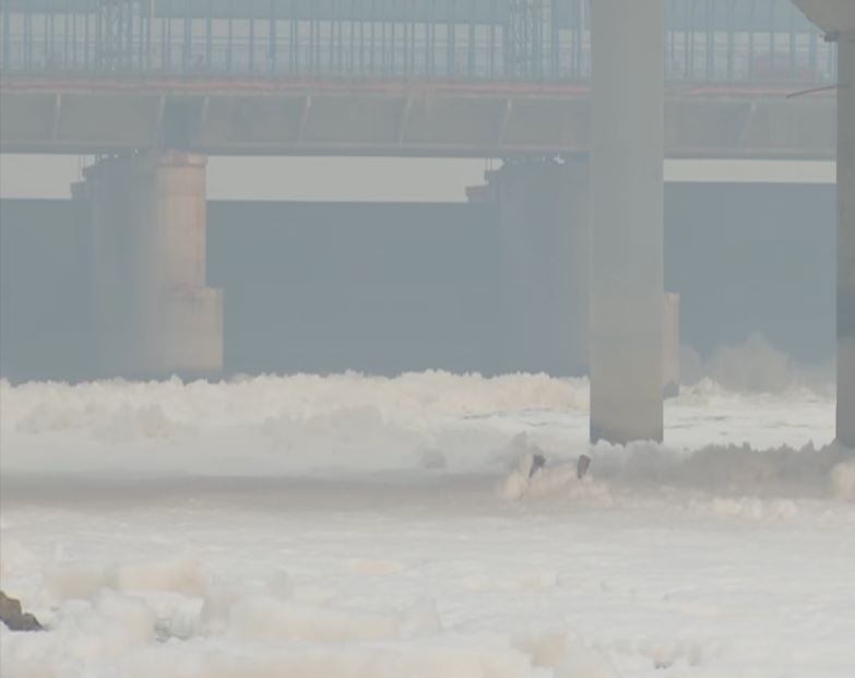 A visual of toxic foam floating over the Yamuna river in Delhi. (Photo/ANI)