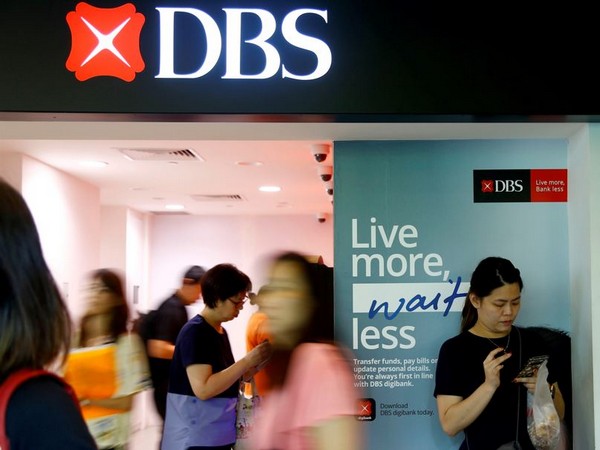 People walk past a DBS branch in Singapore October 8, 2019. 