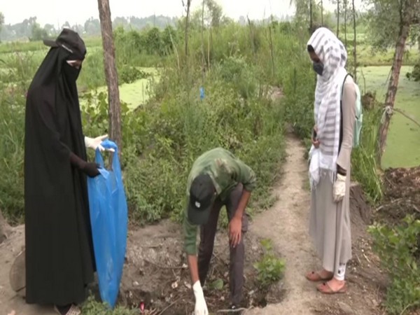 Visuals from cleaning drive in interiors of Dal Lake
