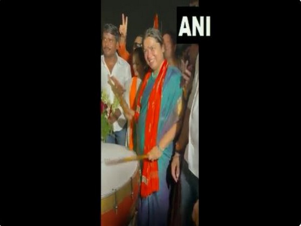 Union Minister Meenakashi Lekhi beating drum (Photo/ANI)