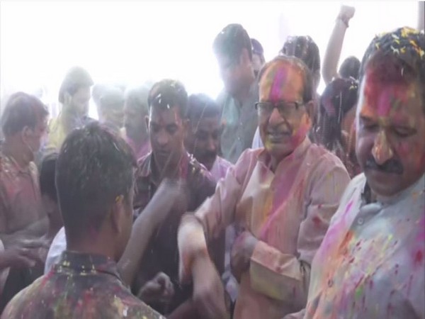 A visual of Holi celebrations from CM Chouhan's residence. (Photos/ANI)