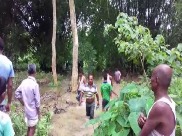 Two people died after massive flood swallowed their boat on Friday, in Golaghat (Photo/ANI)