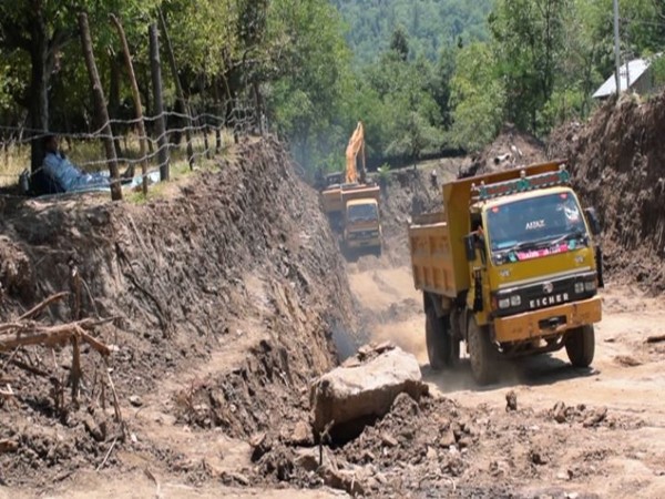 construction work for Tral Lift Irrigation Scheme underway in Pulwama district's Tral (Photo/ANI)