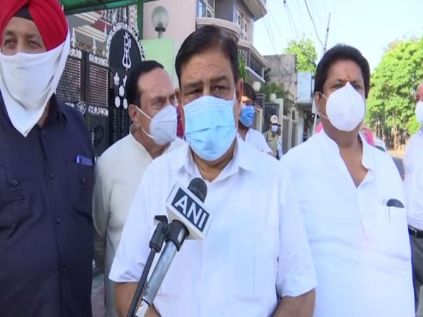 Congress leader Ravinder Sharma speaking to ANI