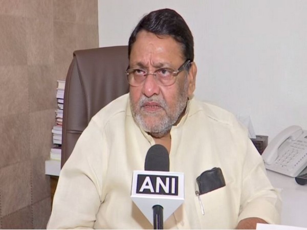 Maharashtra Cabinet Minister Nawab Malik while speaking to ANI on Thursday (Photo/ANI)