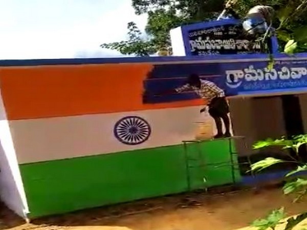 YSRCP government replaced the tricolour painted on a wall of a government building with party colours in Anantapuram. Photo/ANI